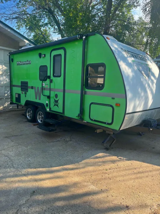 Considering an RV rental? This vibrant green Winnebago Minnie travel trailer is ready for adventure.. Winnebago Other 2013