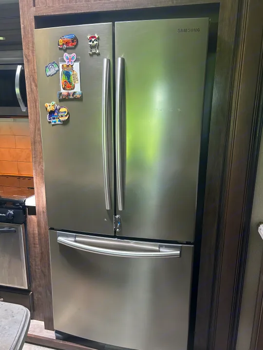 large residential fridge/freezer with ice maker. Grand Design Solitude 2018