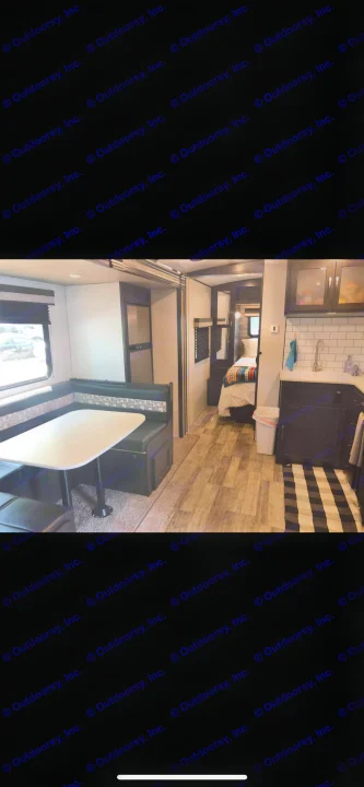 RV rental interior view: dining area, kitchen, and bedroom suite. All the comforts of home on wheels.. Forest River Legend 2019