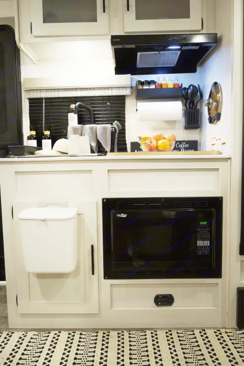 RV rental kitchen: fully equipped with sink, microwave, and organized counter, perfect for on-the-go living.. Forest River R-Pod 193 2022