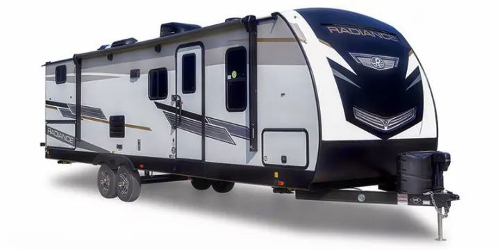 Explore with this white & black Radiance travel trailer RV rental, featuring an awning and spacious design for your adventures.. Cruiser Rv Corp Radiance 2022