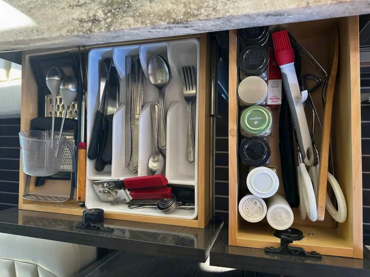 Utensils, spices, cooking tools, and kitchen basics for convenient camping. Airstream Interstate 2014