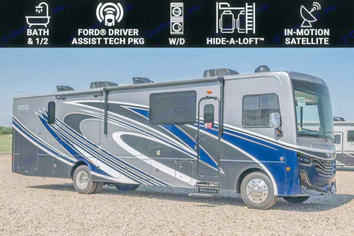 Grey and blue Fortis RV rental with bath & 1/2, W/D, Hide-A-Loft™, and in-motion satellite.. Fleetwood Fortis 2024