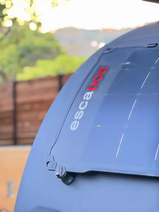 Close-up of an Escapod RV rental's roof with integrated solar panel, ready for off-grid adventures.. Escapod Escapod Trailer 2023