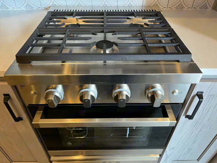 Modern stainless steel gas range & oven provides full cooking capabilities for your RV rental adventures.. Keystone RV Montana High Country 2023