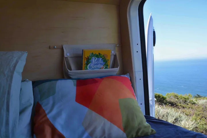 Enjoying a stunning ocean view from a cozy RV rental. Perfect for your next Pacific Coasting adventure!. Mercedes-Benz Sprinter 2021