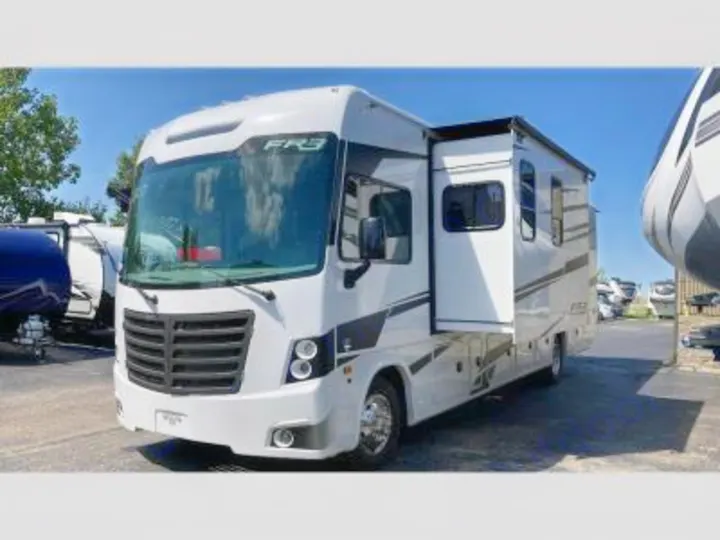 This spacious white FR3 Class A motorhome with its extended slide-out is ideal for your next rv rental journey.. FR3 32DS 2024