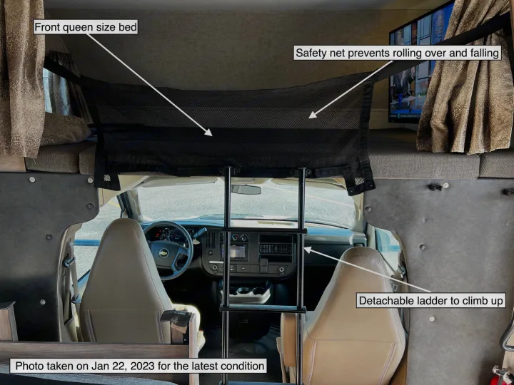 RV rental: front queen bed with safety net, detachable ladder & cockpit view. Photo from Jan 2023.. Forest River Sunseeker LE 2020