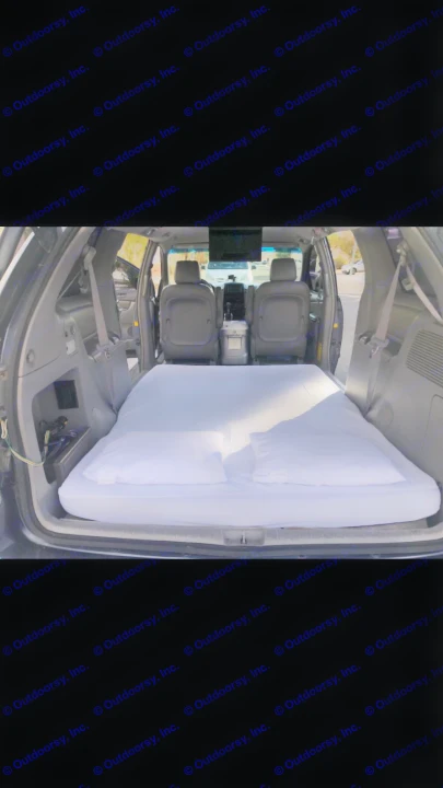 Minivan converted into a cozy sleeper with mattress and pillows. Ideal for car camping, a budget-friendly rv rental alternative.. Other Other 2009