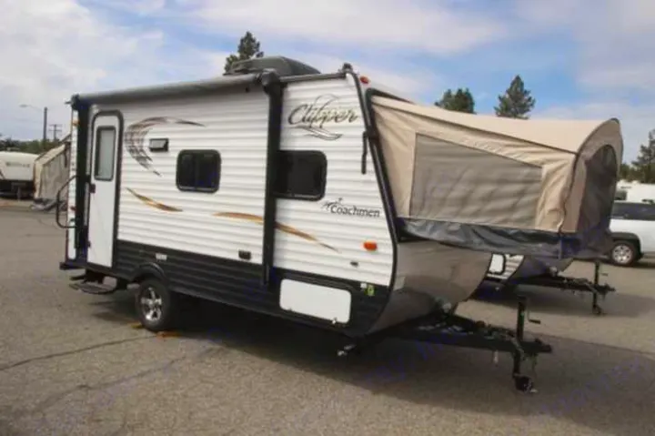 White and black Coachmen Clipper travel trailer with a pop-out tent, ideal for RV rental adventures.. Clipper Clipper Trailer 2016