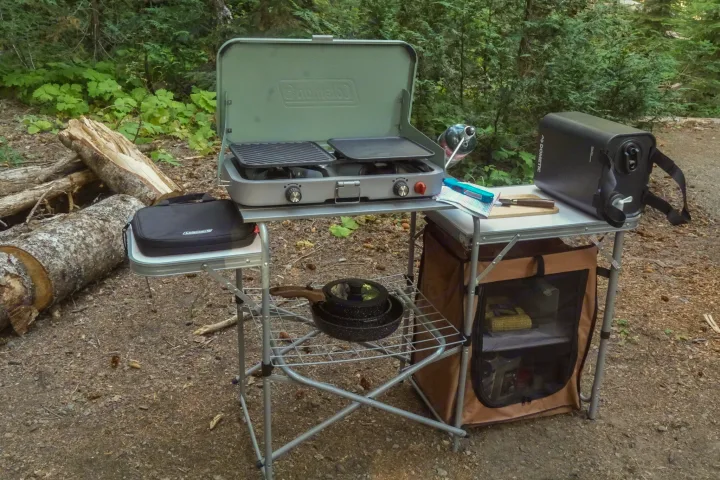 Essential camp kitchen for your RV rental adventure: Coleman grill/griddle, Dometic water, and full cooking setup.. Subaru Outback with iKamper 2017