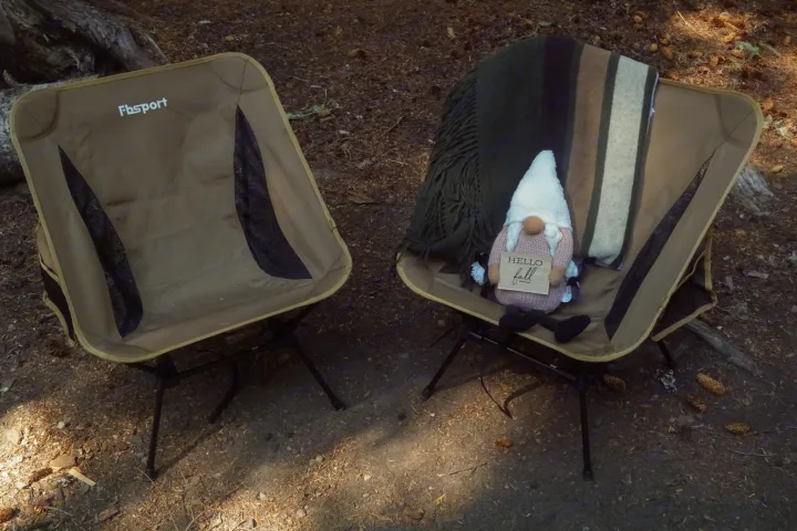 Enjoy your RV rental getaway with these Fbsport portable camping chairs, cozy blanket, and a "Hello Fall" gnome at your campsite.. Subaru Outback with iKamper 2017