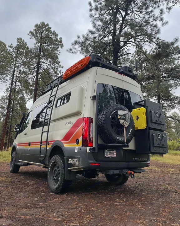 This Storyteller Overland Mode 4x4 adventure van, an ideal rv rental, is equipped for off-road journeys through the pines.. Storyteller Overland Storyteller Overland Class B 2022