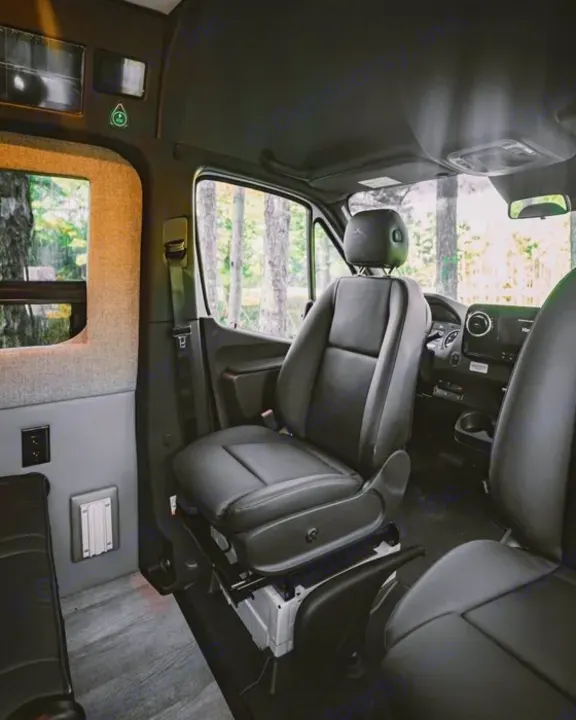 Explore comfort in this RV rental's cozy van interior! Swivel passenger seat, power outlets, & nature views for your next adventure.. Storyteller Overland Storyteller Overland Class B 2022