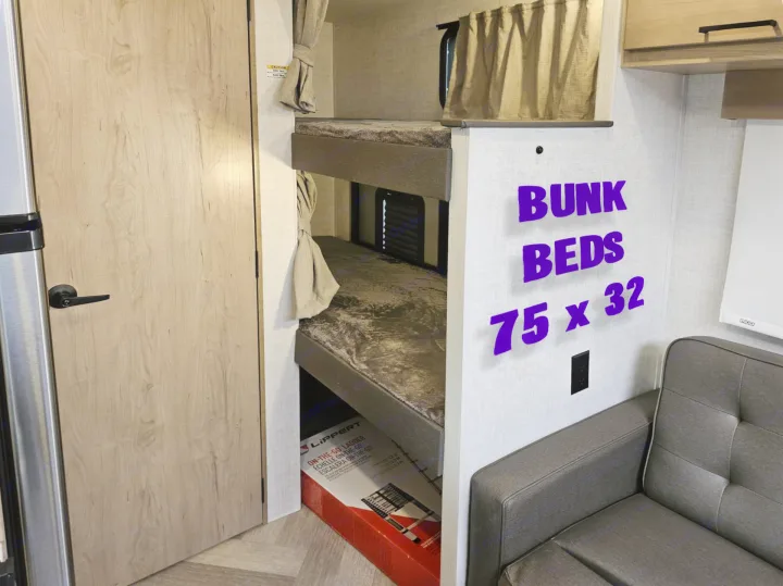 Spacious RV rental with 75x32 bunk beds, privacy curtains, and a sofa. Great for family trips!. Ember Overland 2022