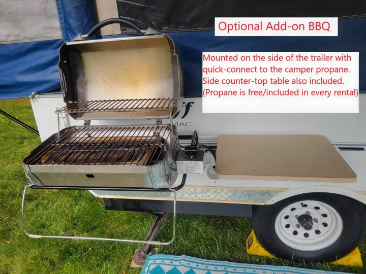 Pop-up camper RV rental with an optional side-mounted BBQ grill & counter for easy outdoor cooking setup.. Forest River Flagstaff M.A.C. 2011