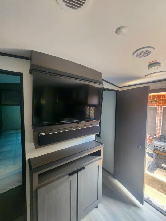 Entryway/TV in front of the master bedroom.. Cruiser RV MPG Ultra Lite 2021