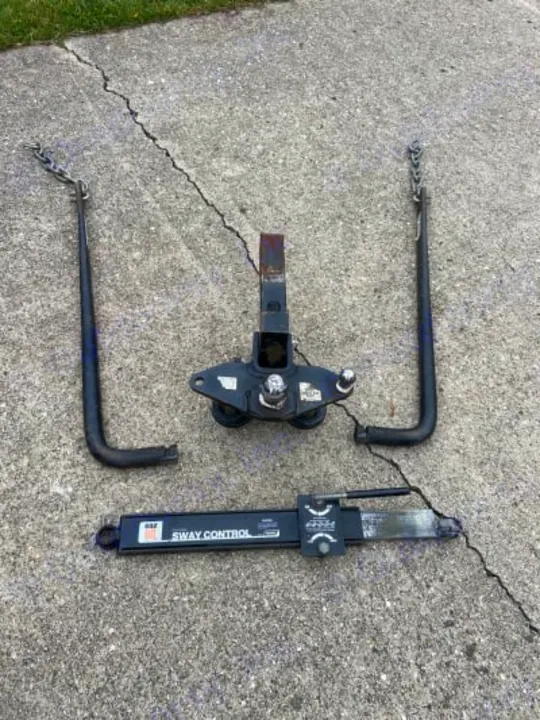 RV rental towing setup: Weight distribution hitch, bars, and sway control for a smoother, safer journey.. Cherokee wolf pup 2021