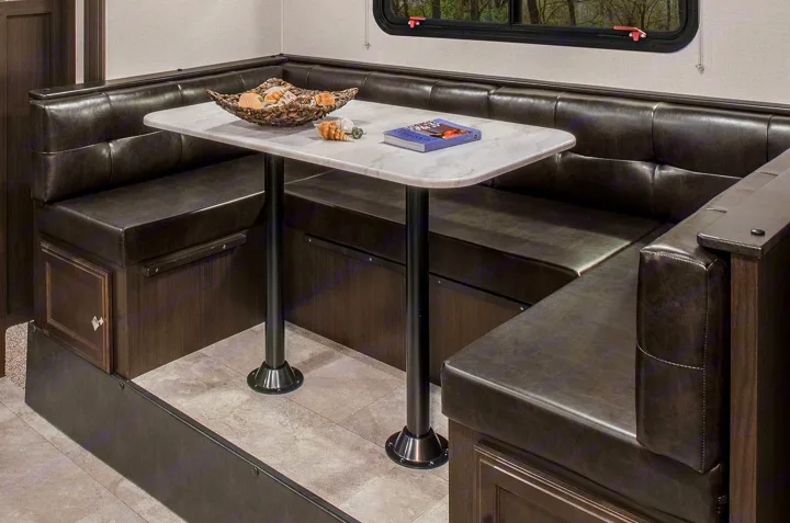 Step inside this RV rental's comfortable U-shaped dinette: dark seating, marble-look table, and scenic window views.. Sonic Sonic Trailer 2019