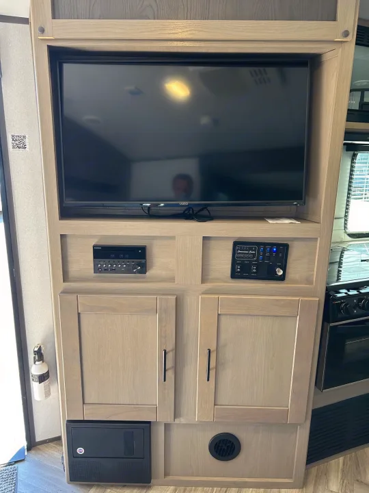 RV rental media center with Vizio TV, Furrion stereo, convenience panel, and power distribution, all for your comfort.. Cruiser Rv Corp Shadow Cruiser 259BHS 2021