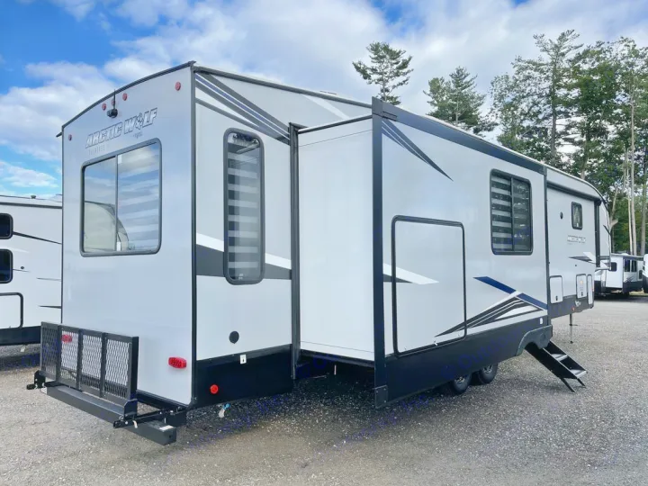 This modern Arctic Wolf travel trailer, featuring a slide-out & cargo rack, is ready for your RV rental adventure.. Forest River Cherokee Arctic Wolf 2022