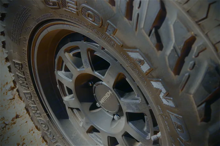 Rugged off-road tire and Mayhem custom wheel, ideal for a memorable RV rental adventure.. toyota tacoma trd 4x4 2018