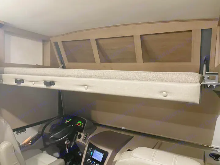 RV rental interior showing a comfortable cab-over bunk bed above the driver's area.. FR3 FR3 Motorhome 2020