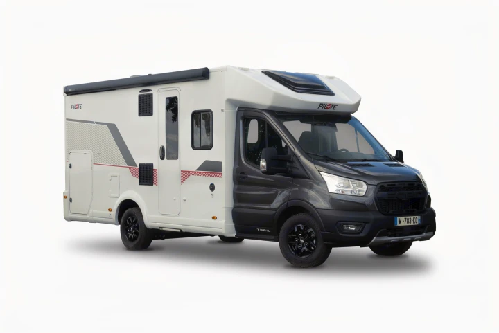 Side view of a modern white & dark gray Pilote Trail RV, great for rv rental. Isolated studio shot of camper van.. PILOTE A696G Atlas 2025