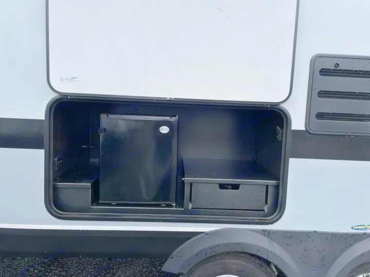 RV rental: Exterior RV storage with mini-fridge and a convenient pull-out drawer for outdoor gear.. Jayco Jay Feather 2022