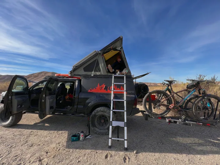 Explore the desert in this custom overlanding truck with rooftop tent & bikes. Ideal **RV rental** for adventure!. Toyota Tacoma - GoFastCamper 2007