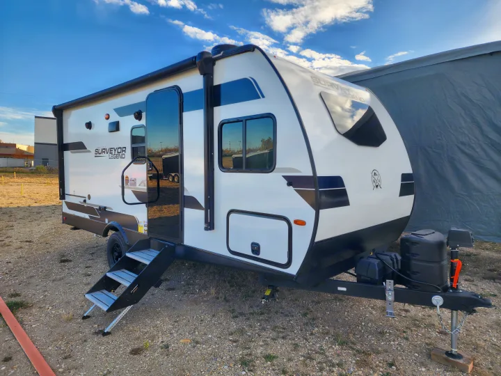 This new Surveyor Legend travel trailer is perfect for your next RV rental adventure. Ready for pickup on a clear day.. Forest River Surveyor 19BHLE 2024
