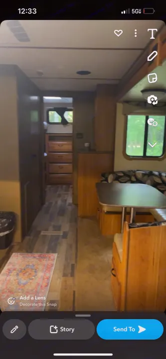 Inside this RV rental, find a comfortable dinette & a hallway leading to a sleeping area with multiple drawers. Ideal for travel.. Starcraft Travel Star 2016