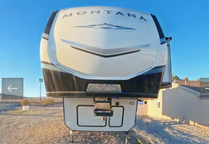 Front exterior of a Montana Fifth Wheel RV, ideal for your next rv rental. Spacious travel trailer comfort awaits!. Keystone RV Montana 2021