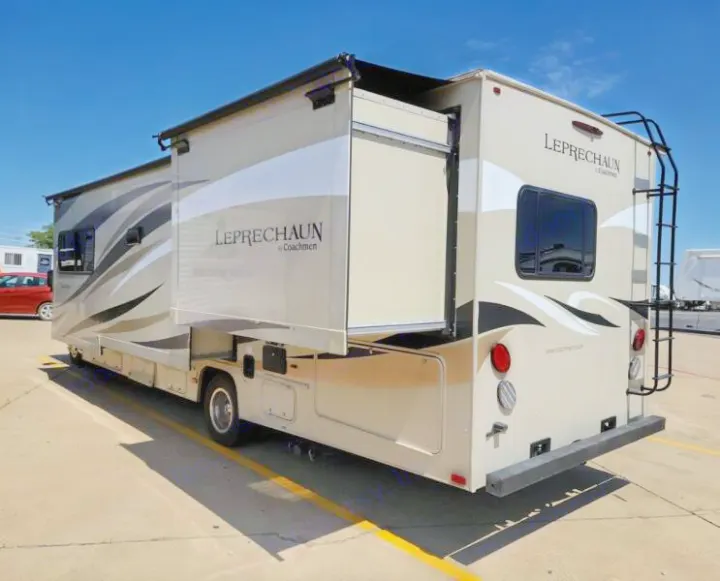This beige Coachmen Leprechaun RV rental features a large extended slide-out, ideal for spacious travel adventures.. Other Other 2019