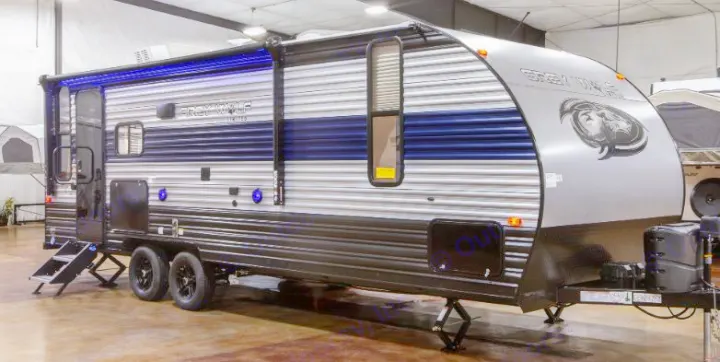 This new Grey Wolf travel trailer RV with blue LED awning lights & steps is ready for adventure! Ideal for rv rental.. Forest River Cherokee Grey Wolf 2022