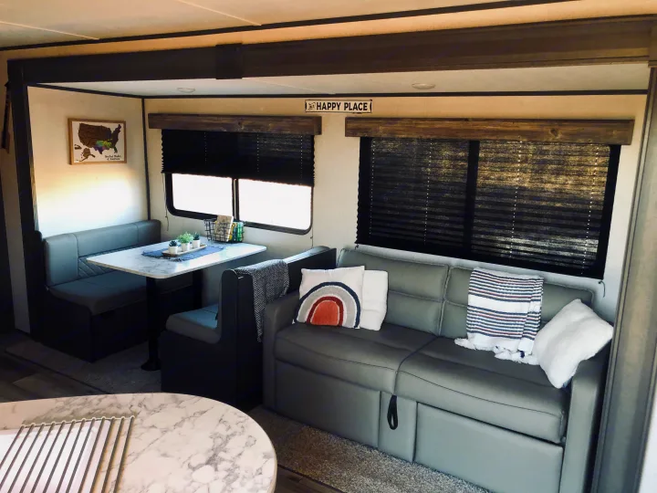 Sofa has pop-out foot rests, or folds down to make a full-size bed. . Aspen Trail LE 2021