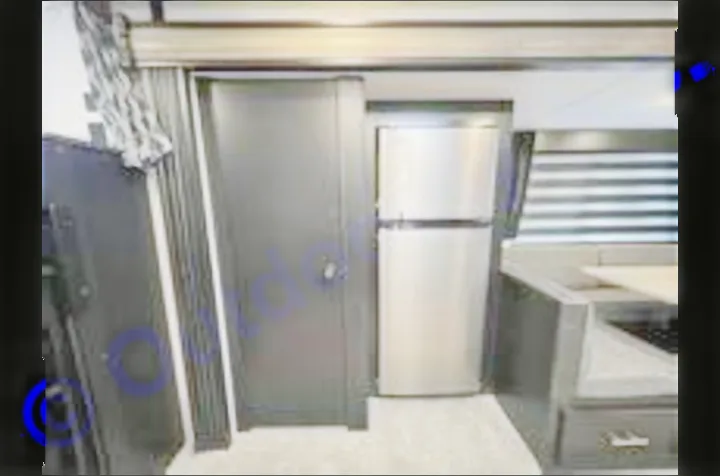 This RV rental's compact interior features a stainless steel fridge, dinette, and sliding door, ideal for road trip living.. Forest River Cherokee 2022