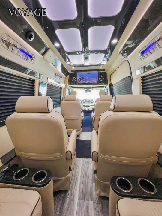 Luxury RV rental interior with plush seating, TV, and elegant lighting. Perfect for comfortable journeys.. Mercedes-Benz Sprinter 419 LWB High Roof 2024