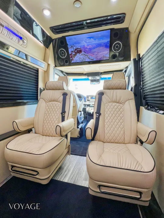 Experience luxury RV rental comfort with plush seating, TV, & custom amenities inside this upscale van.. Mercedes-Benz Sprinter 419 LWB High Roof 2024