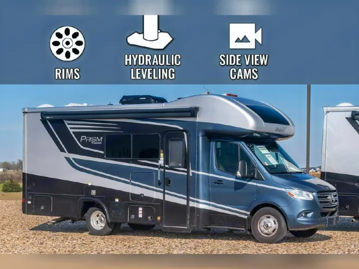 Blue/silver Class C motorhome for RV rental, highlighting features like rims, hydraulic leveling, and side view cams.. Coachmen Prism Elite 2024