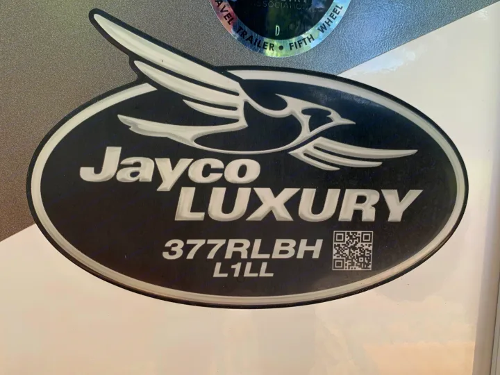 Close-up of a Jayco Luxury 377RLBH RV decal (travel trailer/fifth wheel) for rv rental, showing model details & QR.. Jayco North Point 2021
