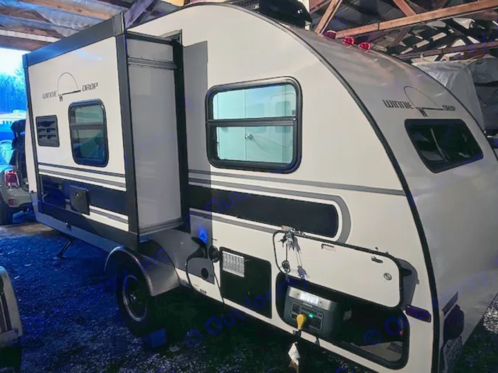 Modern white & black Winnebago Drop teardrop trailer, excellent for your next rv rental adventure. Features slide-out & portable power.. Winnie Drop Winnie Drop Trailer 2017