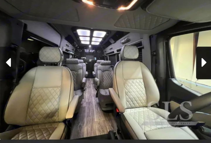Experience luxury! This RV rental boasts a plush interior with light, quilted leather seats and elegant wood-style flooring.. Midwest Automotive Designs Day Cruiser 2024