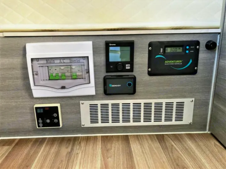 RV rental control panel: Centralized systems for electrical, solar charging (Renogy), and heating (Truma, thermostat).. OBI OBI Popup Trailer 2022