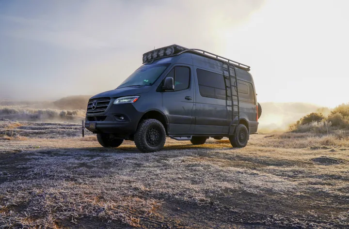 Off-road Mercedes Sprinter camper van on a frosty morning. Ideal RV rental for exploring wintery landscapes.. Mercedes-Benz Sprinter RV Motorhome Campervan 2020