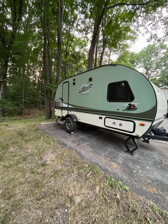 This R-Pod rv rental is set up for camping in a beautiful wooded setting.. R-Pod Hood River Edition 2016