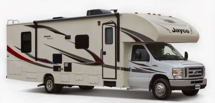 A beige and white Jayco Redhawk Class C RV, perfect for rv rental adventures. Features black & red decals on a Ford chassis.. Jayco Redhawk 2017