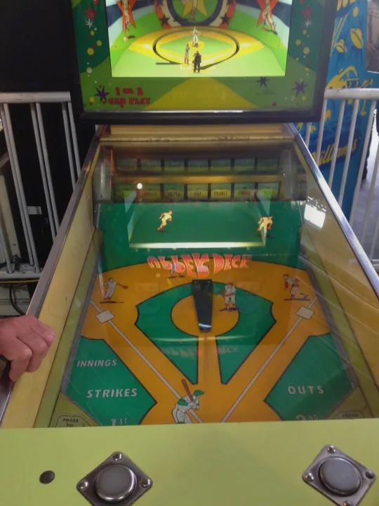 This vintage baseball arcade game, with its green field, animated players, and score indicators, offers classic fun for an RV rental vacation.. Keystone RV Passport Grand Touring 2014