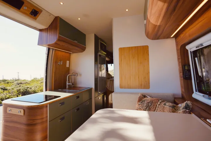 Step inside this modern RV rental! Features a sleek kitchen, cozy living space, and stunning views for your adventure.. Noovo Lite 2023