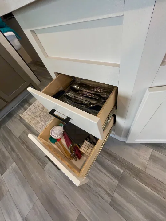 Inside an RV rental: well-organized kitchen drawers with utensils & cooking gadgets.. Jayco Jay Flight 261BHS 2024